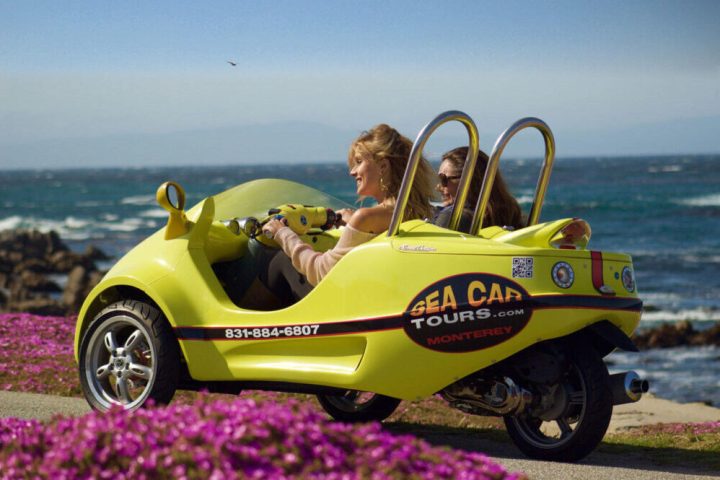 a motorcycle is parked on the beach